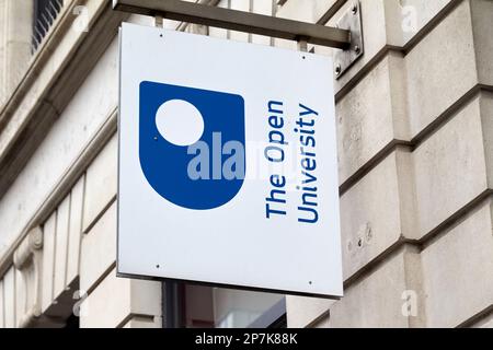the open university logo and sign outside offices in Belfast Northern Ireland UK Stock Photo