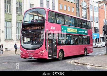 pink metro translink belfast city bus public transport company Belfast Northern Ireland UK Stock Photo