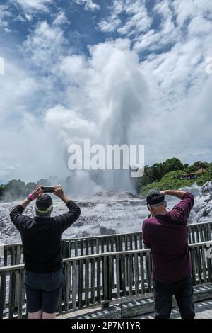 Tourists Photographing Geyser Stock Photo - Alamy