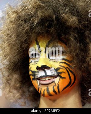 A patch for the NFL's Salute to service is seen on a sleeve of a fan during  warmup before an NFL football game between the Cincinnati Bengals and the  Carolina Panthers, Sunday