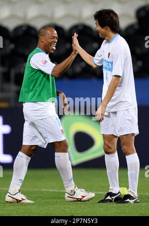 Pohang Steelers Brazilian player Denilson. foreground right, reacts with  teammates, after scoring the second goal against TP Mazembe during their  Club World Cup soccer match in Abu Dhabi, United Arab Emirates, Friday