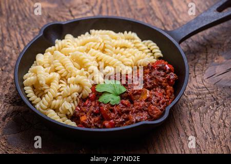 hungarian goulash with spirelli pasta Stock Photo