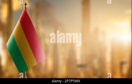 Small flags of the Bolivia on an abstract blurry background Stock Photo