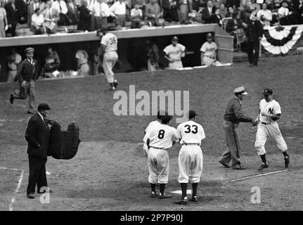 https://l450v.alamy.com/450v/2p7p90j/file-in-this-oct-5-1949-file-photo-new-york-yankees-tommy-henrich-right-is-greeted-by-a-stadium-attendant-as-he-approaches-home-plate-after-hitting-the-game-winning-ninth-inning-home-run-to-beat-the-brooklyn-dodgers-1-0-in-the-first-game-of-the-world-series-at-yankee-stadium-in-new-york-teammates-yogi-berra-8-and-coach-bill-dickey-33-stand-at-home-plate-ready-to-greet-henrich-dodgers-pitcher-don-newcombe-36-strides-towards-the-dodgers-dugout-henrich-died-on-tuesday-dec-1-2009-in-dayton-ohio-the-yankees-said-he-was-96-ap-photofile-2p7p90j.jpg