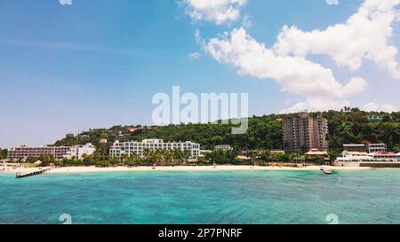 The beautiful blue waters and white sand beaches of Doctor's Cave Beach in Montego Bay, Jamaica. Stock Photo