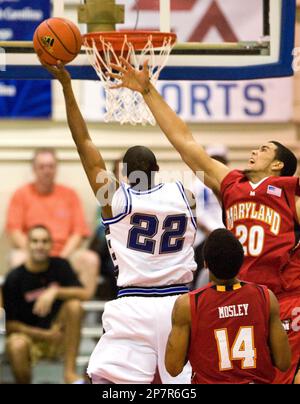 Chaminade guard Cartier Carter 22 shoots over Maryland forward