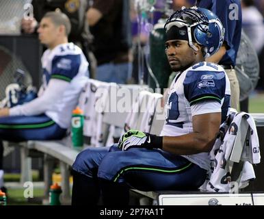 Seattle Seahawks' linebacker D.D. Lewis (54) hits Indianapolis Colts' wide  receiver Troy Rogers as he catches the ball during the second quarter of an NFL  football game Saturday, Dec. 24, 2005 in