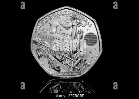 Reverse side of a 2022 50p coin featuring the Hogwarts Express to commemorate 25 years of Harry Potter Stock Photo