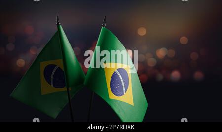 Small Flags Of The Brazil On An Abstract Blurry Background Stock Photo 