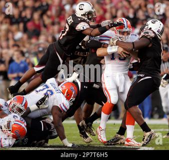 Florida quarterback Tim Tebow (15) scrambles on the run from the LSU  defence during the first half action in the game between #1 ranked Florida  Gators and the #4 ranked LSU Tigers