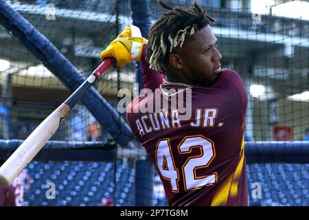 Venezuela's Ronald Acuna Jr. (42) walks to the dugout before an