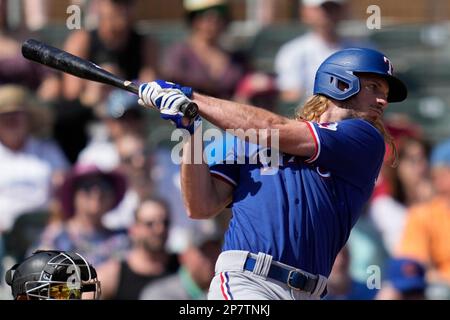 Texas Rangers' Travis Jankowski follows through on his RBI double