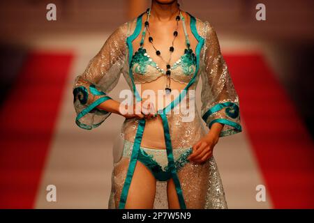 A model wears lingeries during the Ordifen Cup for Innovative Undergarments  Elements Design 2009 at China Fashion Week in Beijing, China, Friday, Nov.  6, 2009. (AP Photo/Elizabeth Dalziel Stock Photo - Alamy