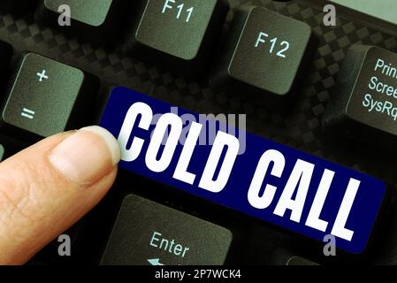 Sign displaying Cold Call. Word for Unsolicited call made by someone trying to sell goods or services Stock Photo