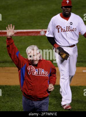 Philadelphia Phillies' Mike Schmidt watches the flight of his