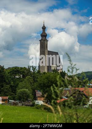The church Mariä Himmelfahrt in Germany Bavaria in the village of Anger, hill cloudy sky Stock Photo