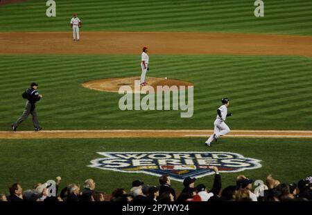 Philadelphia Phillies Pedro Martinez watches New York Yankees Derek Jeter  and Johnny Damon high five after Hideki Matsui drives in 2 runs with a  single in the third inning of game 6