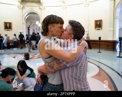 Austin, Texas, USA. 8th Mar, 2023. KENDALL JACKSON, left, and MAC EGGIMANN, of Austin, embrace in the rotunda of the Texas Capitol as they attend a rally for transgender rights organized by the Transgender Education Network of Texas (TENT), two days before a bill filing deadline at the 88th Texas Legislature. Dozens of anti-LGBTQ bills have been filed in the House and the Senate. (Credit Image: © Bob Daemmrich/ZUMA Press Wire) EDITORIAL USAGE ONLY! Not for Commercial USAGE! Stock Photo