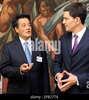 Japan's Foreign Minister Katsuya Okada, left, talks with Britain's Foreign Secretary David Miliband at the United Nations headquarters Tuesday, Sept. 22, 2009. (AP Photo/Tsutomu Kobayashi, Japan Pool)