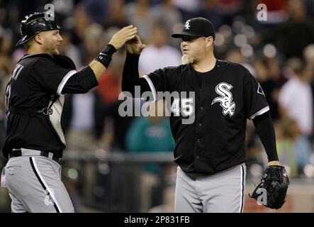 Chicago White Sox reliever Bobby Jenks, right, and catcher A.J. Pierzynski,  left, celebrate after defeating the Boston Red Sox in Game 2 of the  American League Division Series Wednesday, Oct. 5, 2005