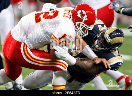 Kansas City Chiefs quarterback Brodie Croyle left is sacked for