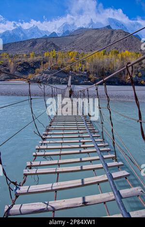 Hussaini bridge was built under the Era of British rule in the village of Shishkat in Gojal. However, during Karakoram highway construction, this brid Stock Photo