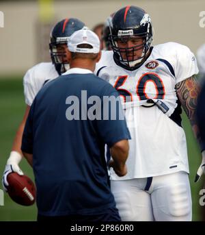 Denver Broncos guard Zane Beadles (68) congratulates wide receiver