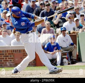 Pittsburgh Pirates' Derrek Lee hits an RBI single against the Chicago Cubs  during the first inning of a baseball game on Saturday, Sept. 3, 2011, in  Chicago. (AP Photo/Nam Y. Huh Stock