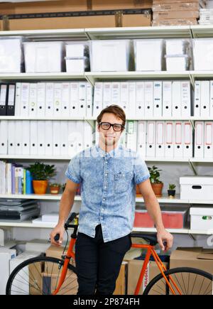 I live and work green. a stylish young man in an office. Stock Photo