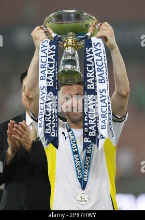 Tottenham Hotspur`s Robbie Keane with the trophy Barclays Asia
