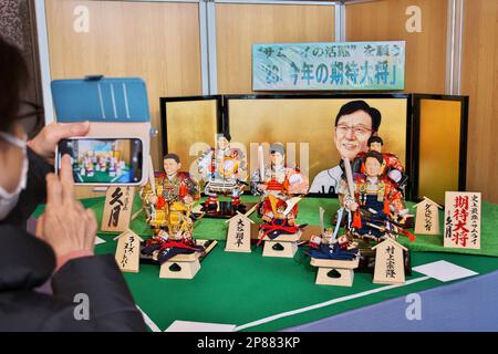 Tokyo, Japan. 09th Mar, 2023. A visitor takes photos Japan's traditional 'Boys' May Festival dolls' modeled Los Angeles Angels Shohei Ohtani at headquarters of traditional doll maker Kyugetsu in Tokyo, Japan on Thursday, March 9, 2023. Photo by Keizo Mori/UPI Credit: UPI/Alamy Live News Stock Photo