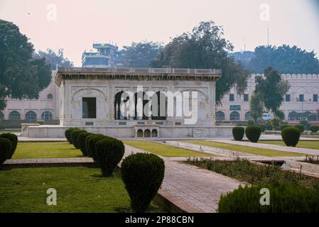 Hazuri Bagh is a garden in Lahore, Punjab, Pakistan, bounded by the Lahore Fort to the east, Badshahi Mosque to the west, the Samadhi of Ranjit Singh Stock Photo