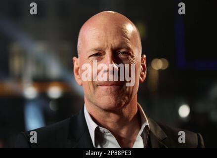 File photo dated 07/02/2013 of Bruce Willis arriving for the UK film premiere of A Good Day To Die Hard, at the Empire Leicester Square in central London. The family of US actor Bruce Willis revealing that he had been diagnosed with dementia has meant thousands more visitors to the Alzheimer's Society website, the charity said. Issue date: Thursday March 9, 2023. Stock Photo