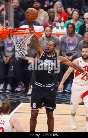 Los Angeles, California, USA. 8th Mar, 2023. Los Angeles Clippers forward Kawhi Leonard dunks against the Toronto Raptors during an NBA basketball game at Crypto.com Arena in Los Angeles Tuesday, March 8, 2023. (Credit Image: © Ringo Chiu/ZUMA Press Wire) EDITORIAL USAGE ONLY! Not for Commercial USAGE! Credit: ZUMA Press, Inc./Alamy Live News Stock Photo