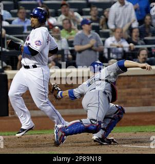 Los Angeles Dodgers' Gary Sheffield slides safely into second as Florida  Marlins second baseman Craig Counsell can't turn the play in the first  inning on a ball hit by Raul Mondesi at