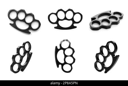 Set with metal black brass knuckles on white background Stock Photo