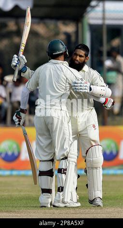 Yousaf Rind Pakistan's cricketer Mohammad Yousaf, right, acknowledges after ...