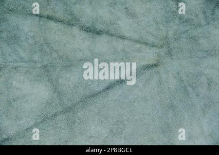 Light blue, gray suede cut as background textured and wallpaper. Rustic style leather Stock Photo