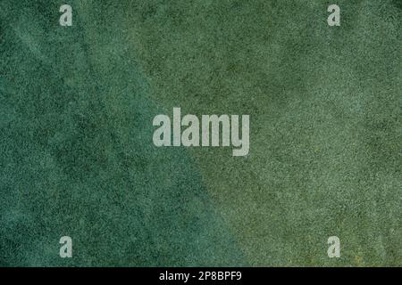 Green suede cut as background textured and wallpaper. Rustic style leather Stock Photo