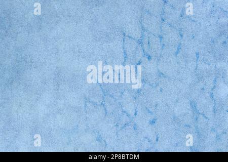 Light blue suede cut as background textured and wallpaper. Rustic style leather Stock Photo