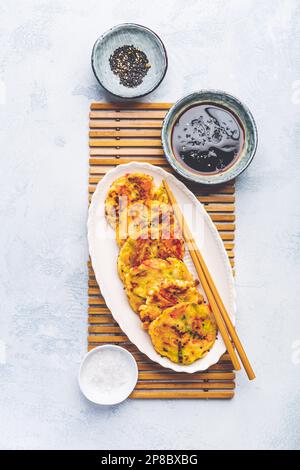 Korean vegetable pancakes with dipping sauce, Korean pizza - Asian food style Stock Photo