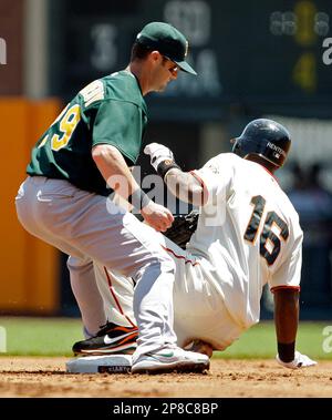 Edgar Renteria (16) of the San Francisco Giants fouls off a pitch from  Wandy Rodriguez (51) of the Houston Astros in the first inning of their  game on Thursday, June 24, 2010