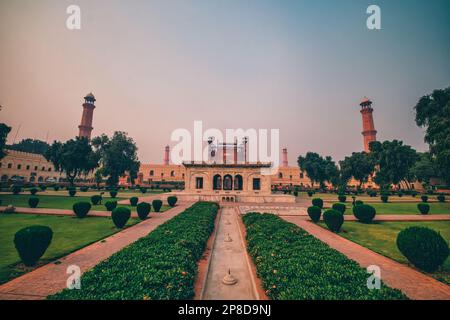 Hazuri Bagh is a garden in Lahore, Punjab, Pakistan, bounded by the Lahore Fort to the east, Badshahi Mosque to the west, the Samadhi of Ranjit Singh Stock Photo