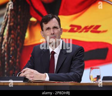 Troisdorf, Deutschland. 09th Mar, 2023. Tobias Meyer, successor to CEO Frank Appel, sits on the podium at the Deutsche Post DHL Annual Press Conference in Troisdorf near Bonn on 09.03.2023. Credit: Juergen Schwarz/Alamy Live News Stock Photo