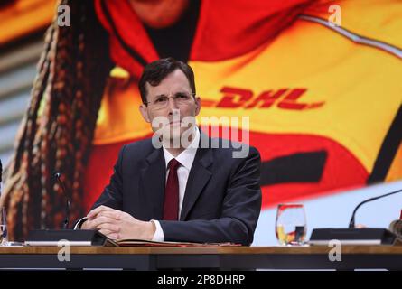 Troisdorf, Deutschland. 09th Mar, 2023. Tobias Meyer, successor to CEO Frank Appel, sits on the podium at the Deutsche Post DHL Annual Press Conference in Troisdorf near Bonn on 09.03.2023. Credit: Juergen Schwarz/Alamy Live News Stock Photo