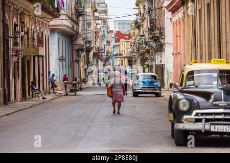 HAVANA, CUBA - JANUARY 11, 2021: Street in the old part of the city on January 11, 2021 in Havana. With its distinct atmosphere, Havana is a very Stock Photo