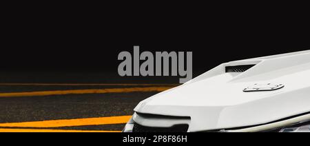 Close up of a air duct on car hood of turbo engine in a white sports car, panoramic banner with copy space Stock Photo