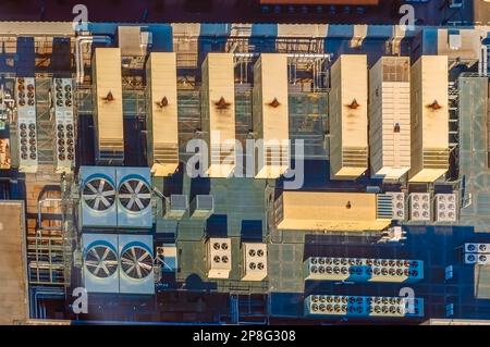 Large HVAC air conditioning units on the roof of the 200 Peachtree building in Atlanta, Georgia, USA, as seen from the Westin Peachtree Plaza Hotel. Stock Photo