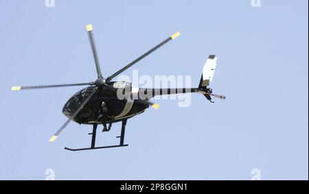 file-in-this-tuesday-sept-25-2007-file-photo-blackwater-security-contractors-are-seen-inside-a-helicopter-above-central-baghdad-iraq-the-us-embassy-has-confirmed-that-the-security-firm-once-known-as-blackwater-worldwide-has-finished-its-work-in-baghdad-on-thursday-may-6-2009-the-company-has-become-a-flashpoint-for-iraqi-anger-after-contractors-killed-17-civilians-in-baghdad-in-2007-ap-photokhalid-mohammed-file-2p8ggn1.jpg