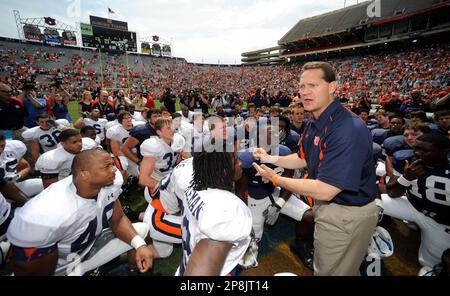 New Auburn football coach Gene Chizik leads his team to the field for their  NCAA college football spring A-day game on Saturday, April 18, 2009 in  Auburn, Ala. (AP Photo/Todd J. Van